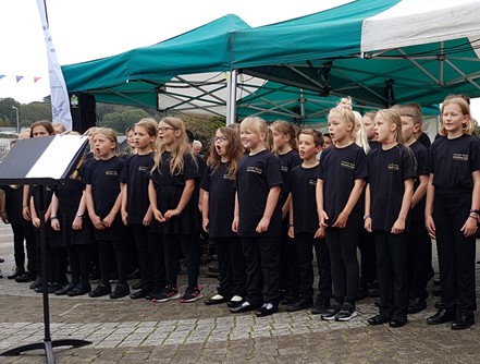 Cornwall County County Girls Choir performing on Lemon Quay